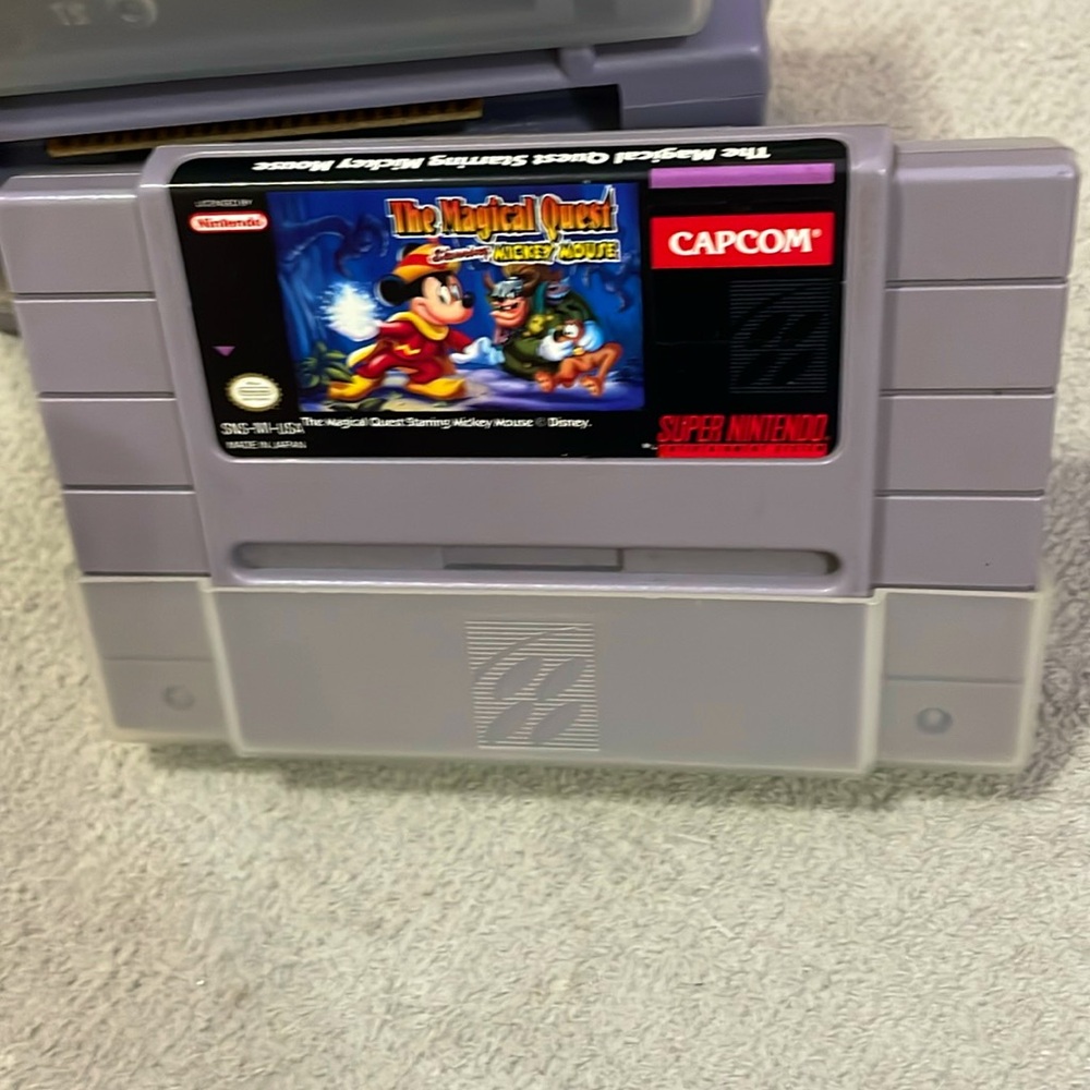 The Magical Quest starring Mickey Mouse Super Nintendo Game with game protector